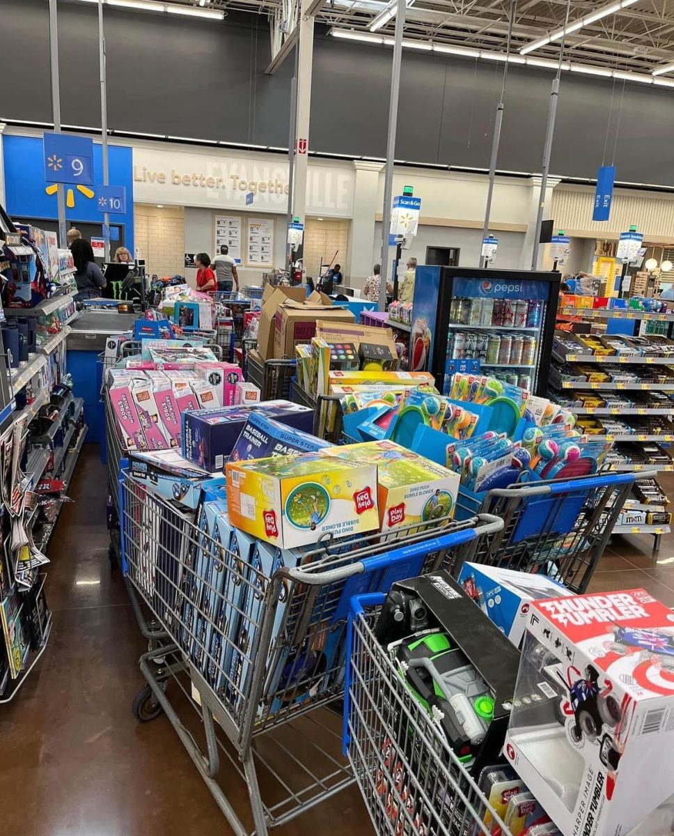 Volunteers buy toys to donate to the cause. 