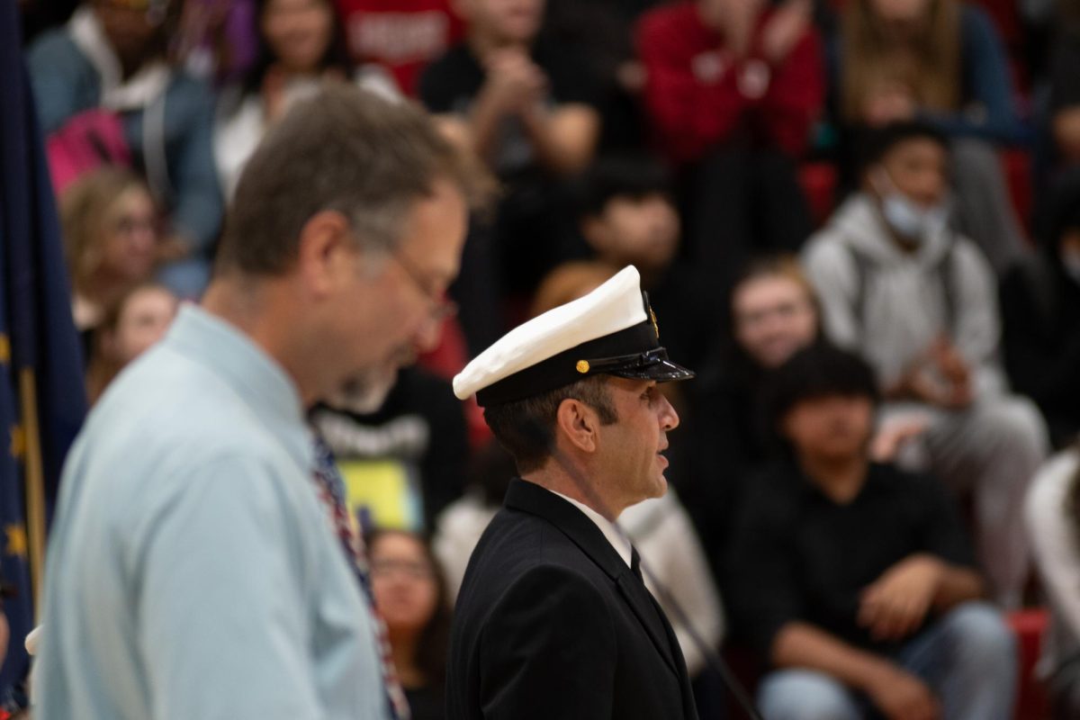 Chief David Scaramazzo stands to be recognized at the annual AHS Veterans' Day program.