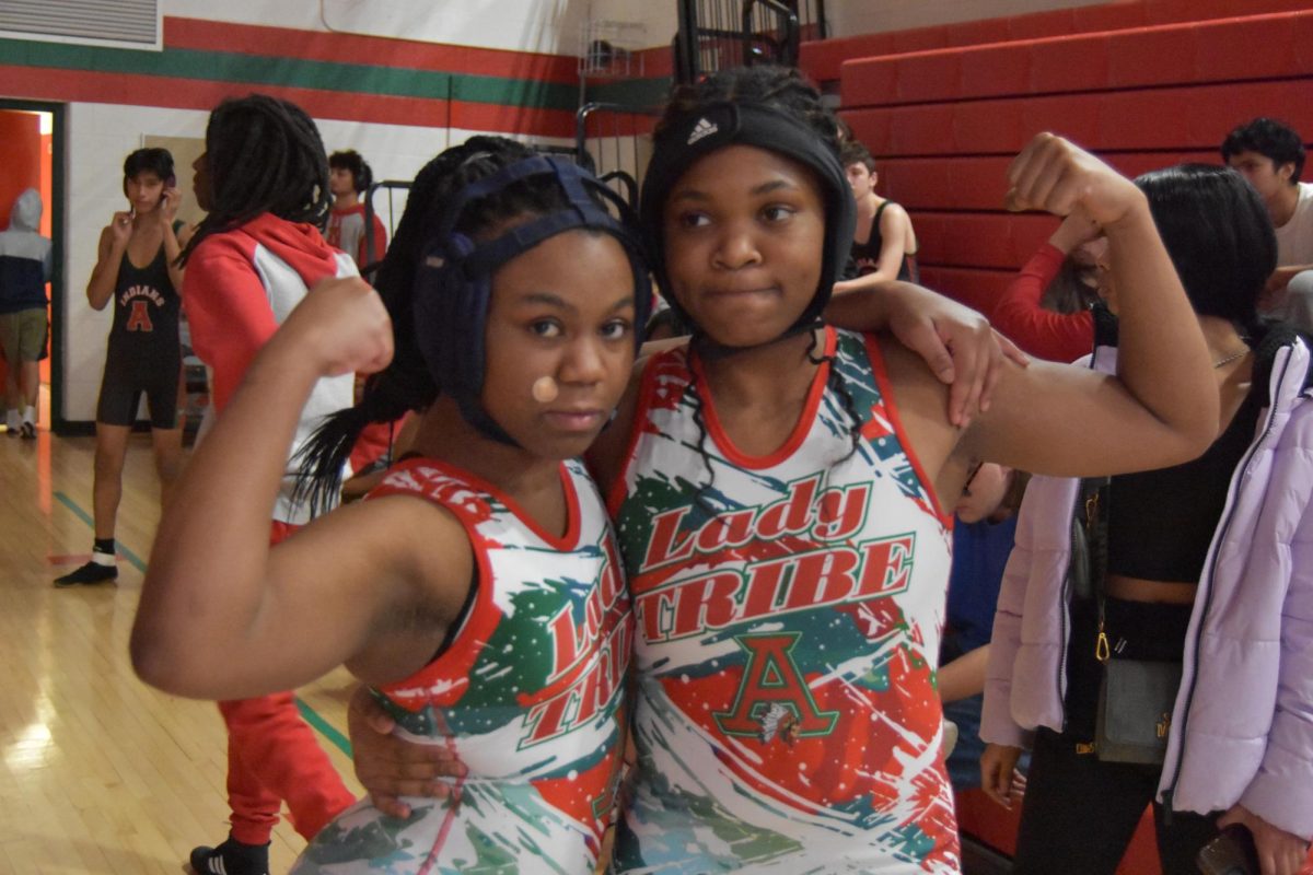 Ashante' Jackson and Taneesha Samuels posed up at their wrestling match. Samuels then goes onto win her match. 