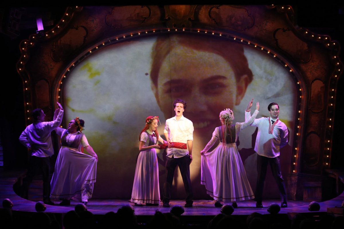 Mischa and the choir performing Talia. Mischa repeats the words “My love, I love you,” in Ukrainian while the choir mimicked a traditional Ukrainian wedding.