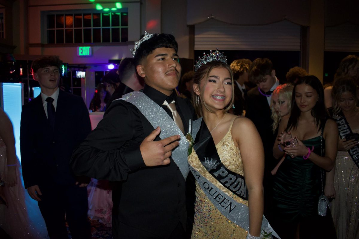 Aaron Ramirez and Abbey Wright posing after officially becoming royalty. 