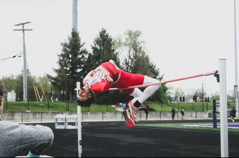 Jensen Shryock clears a high jump.