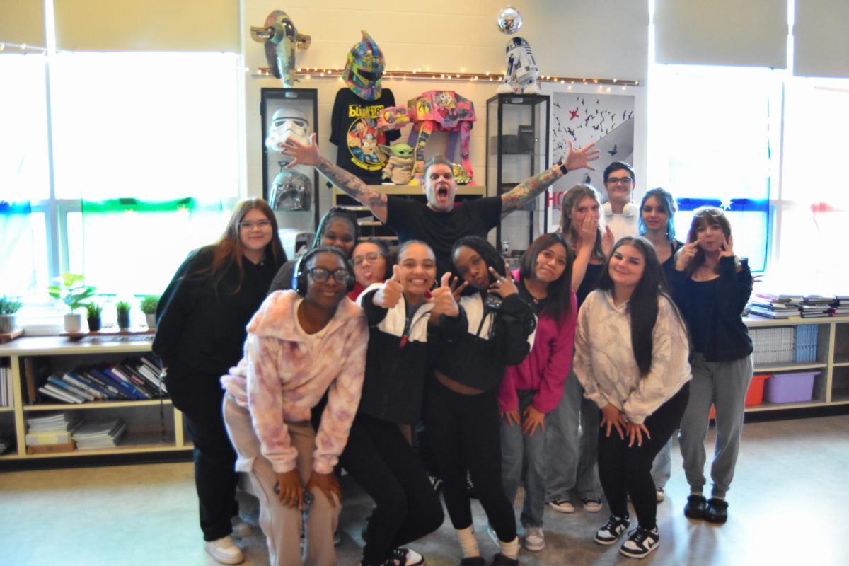 Mr. Foster's yearbook class poses for a photo.