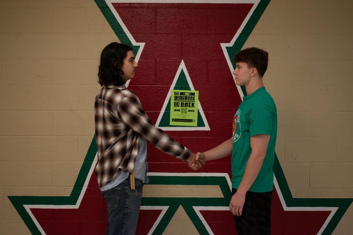 Ryder Elrod (Left) shacking hands with Graham Geer (Right)