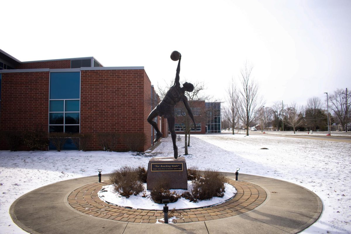 A statue of Johnny Wilson outside of Anderson High School’s north entrance.