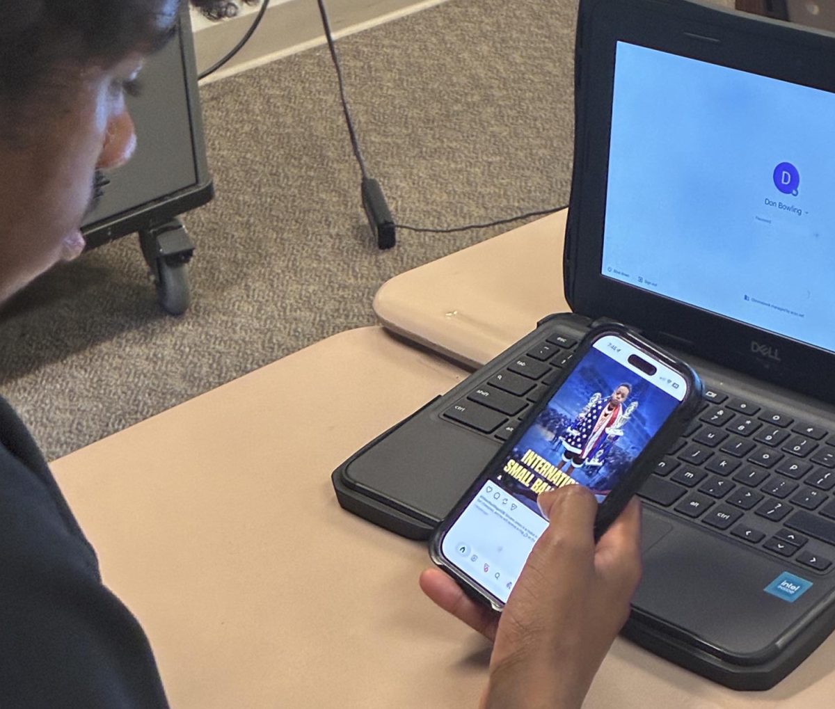 A student accesses social media in class.