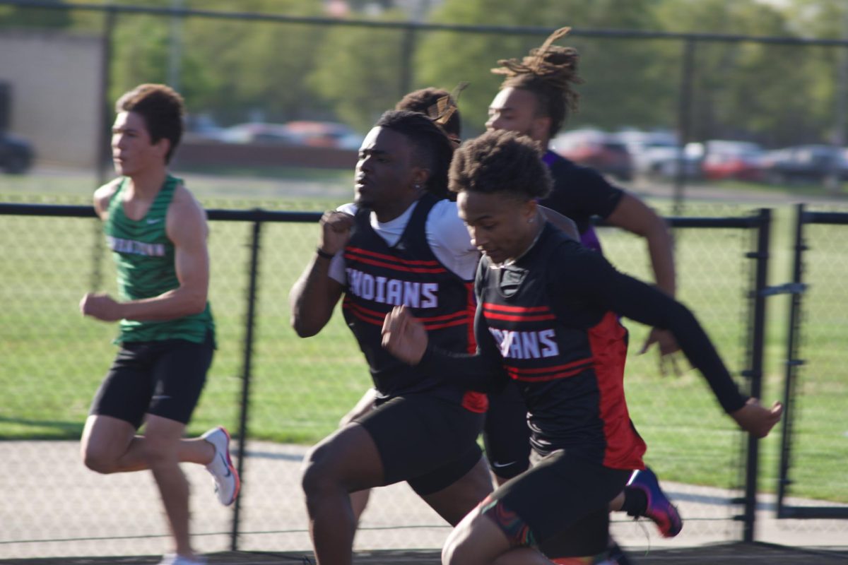 Zarion McMillian runs the 100 meter in a meet against Yorktown and Marion on April 21.